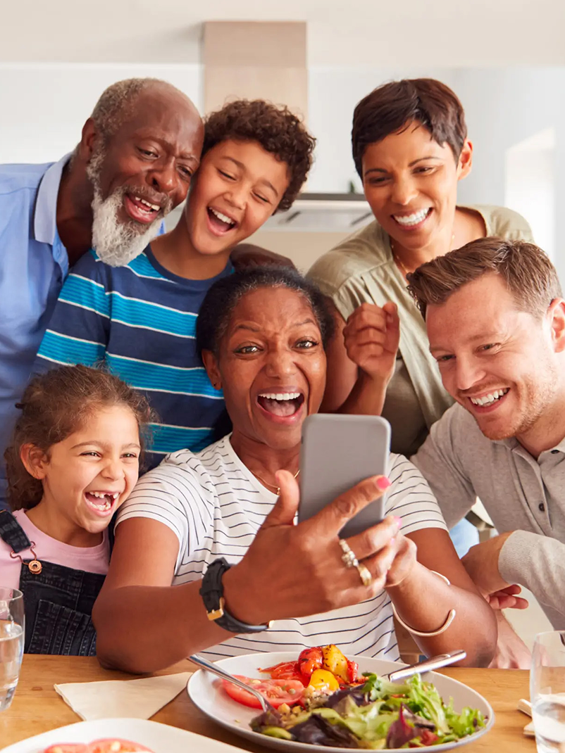 Image of family taking selfie